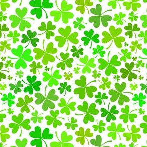 Green clovers on white background