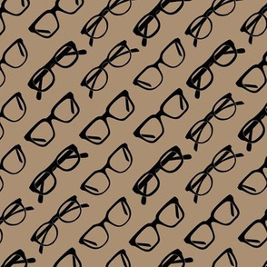 Glasses on flat brown