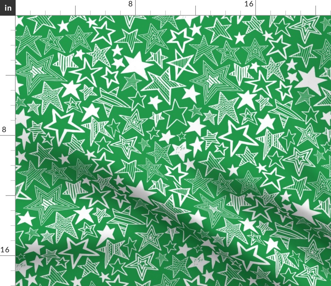 White patterned stars on green background