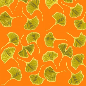 Green Ginkgo Leaves on Bright Orange