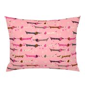 Dappled Dachshunds on Pink