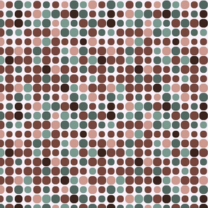 Muted polka dots in sage green, terracotta, and dusty pink.