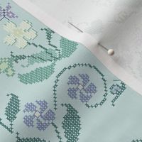 Cross-stitch garden flower sampler embroidery cheater fabric on pale seafoam - look at swatch view to see stitches