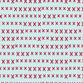 hand cross stitch red on pale blue