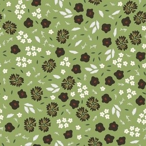 Vector vintage ditsy pattern with small flowers on green background.