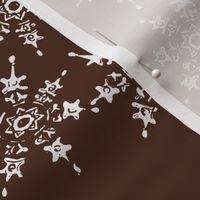 snowflakes on chocolate brown