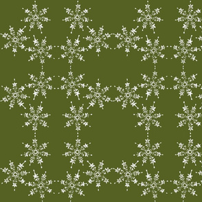 snowflake arrangement on green grass