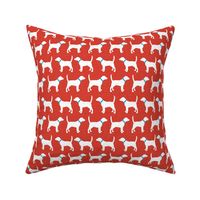 Foxhounds on red linen