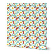 Fried egg and bacon pattern. Breakfast food design. Blue background.