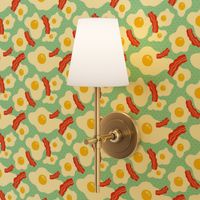 Fried egg and bacon pattern. Breakfast food design. Blue background.