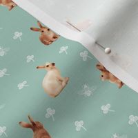 caramel bunnies on peppermint green, wide spaced