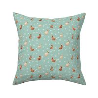 caramel bunnies on peppermint green, wide spaced