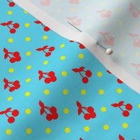 Dots and cherries in light blue and red