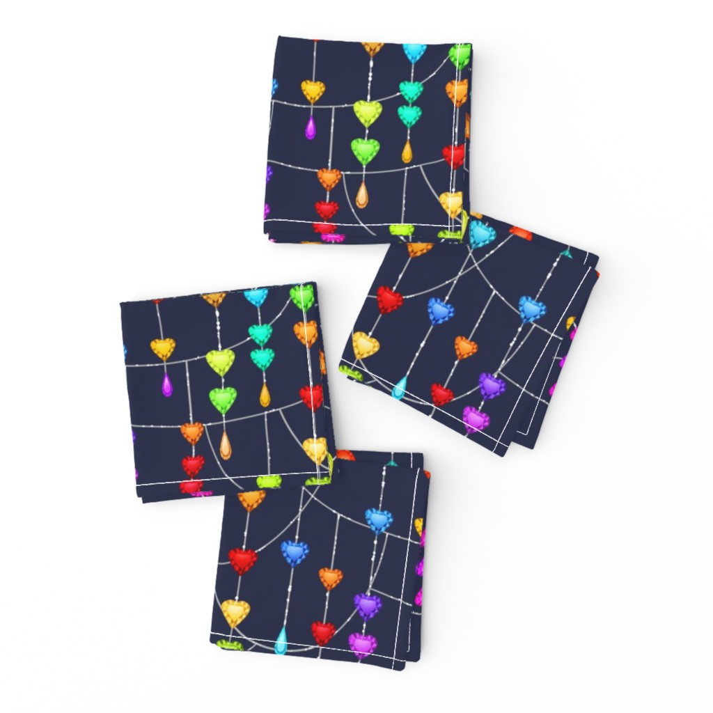 Rainbow Gem Hearts  Dangling on Silver Threads on dark blue background