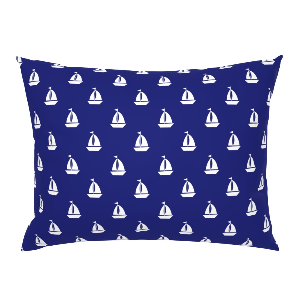 Large White Sailboats on Blue