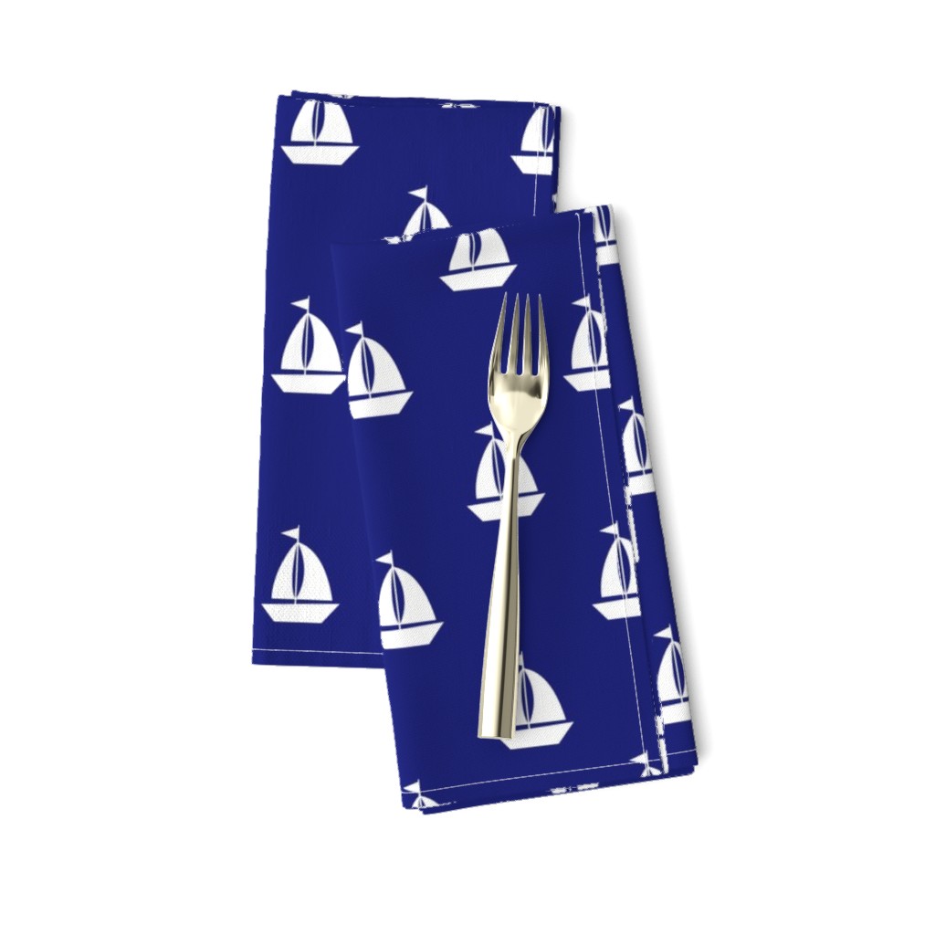 Large White Sailboats on Blue