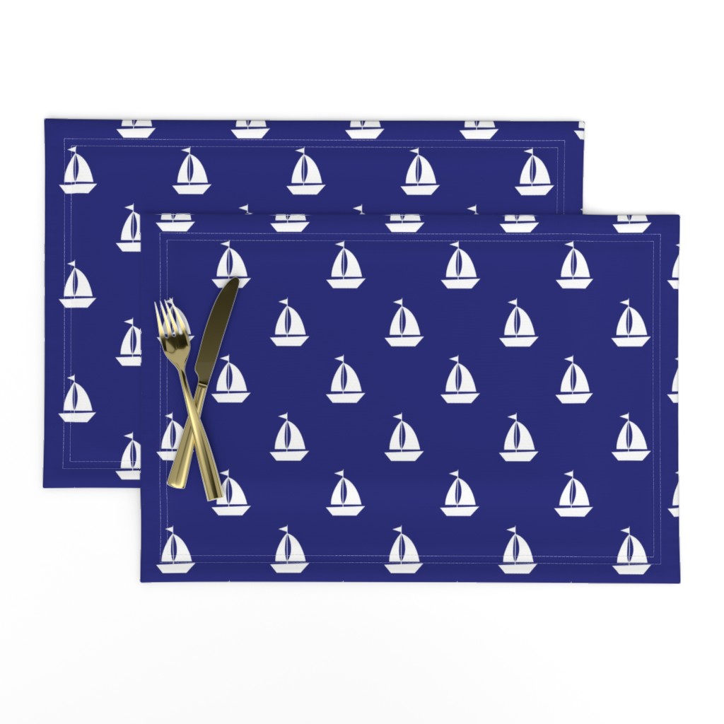 Large White Sailboats on Blue