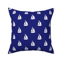 Large White Sailboats on Blue