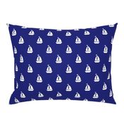 Large White Sailboats on Blue