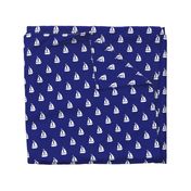 Large White Sailboats on Blue