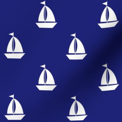 Large White Sailboats on Blue