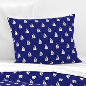 Large White Sailboats on Blue