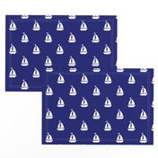 Large White Sailboats on Blue