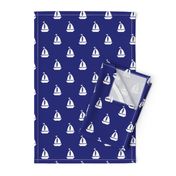 Large White Sailboats on Blue