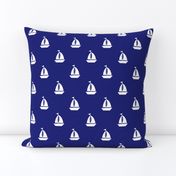 Large White Sailboats on Blue