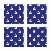 Large White Sailboats on Blue