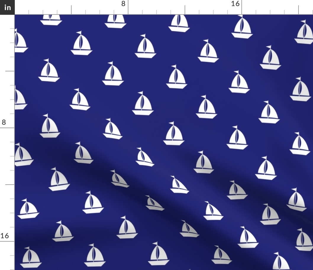 Large White Sailboats on Blue