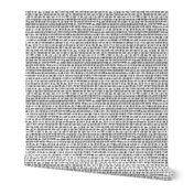 Cuneiform text in black and white, large