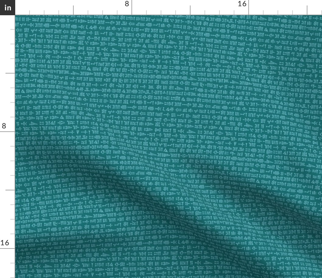 cuneiform text in teal