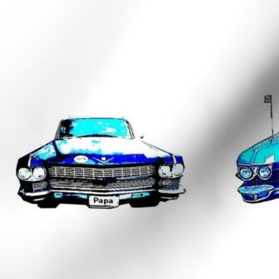 Two blue cadillac