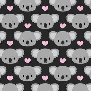 Cute koalas and pink hearts