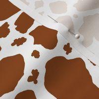 brown chocolate and white cow spots