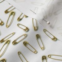gold safety pins