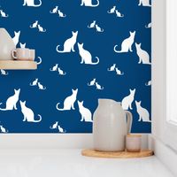 Cats white on blue