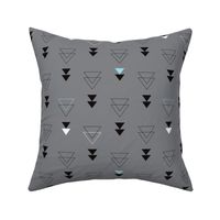 Geometric triangle in trendy black gray white and pastel blue