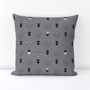 Geometric triangle in trendy black gray white and pastel blue