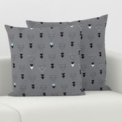 Geometric triangle in trendy black gray white and pastel blue