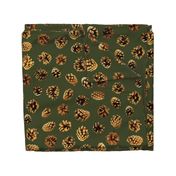 large pine cones Christmascolors browns on pine green