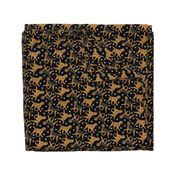 Trotting Border Terriers and paw prints - black