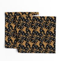 Trotting Border Terriers and paw prints - black