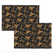 Trotting Border Terriers and paw prints - black