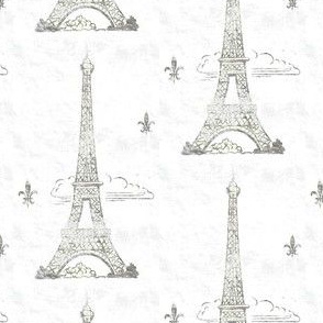 Silver shabby metallic Eiffel Tower in the clouds