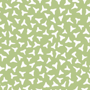 shark tooth silhouettes on pale green