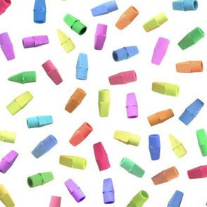 colorful pencil eraser caps on white