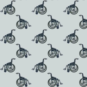 Wheelchairs on light grey