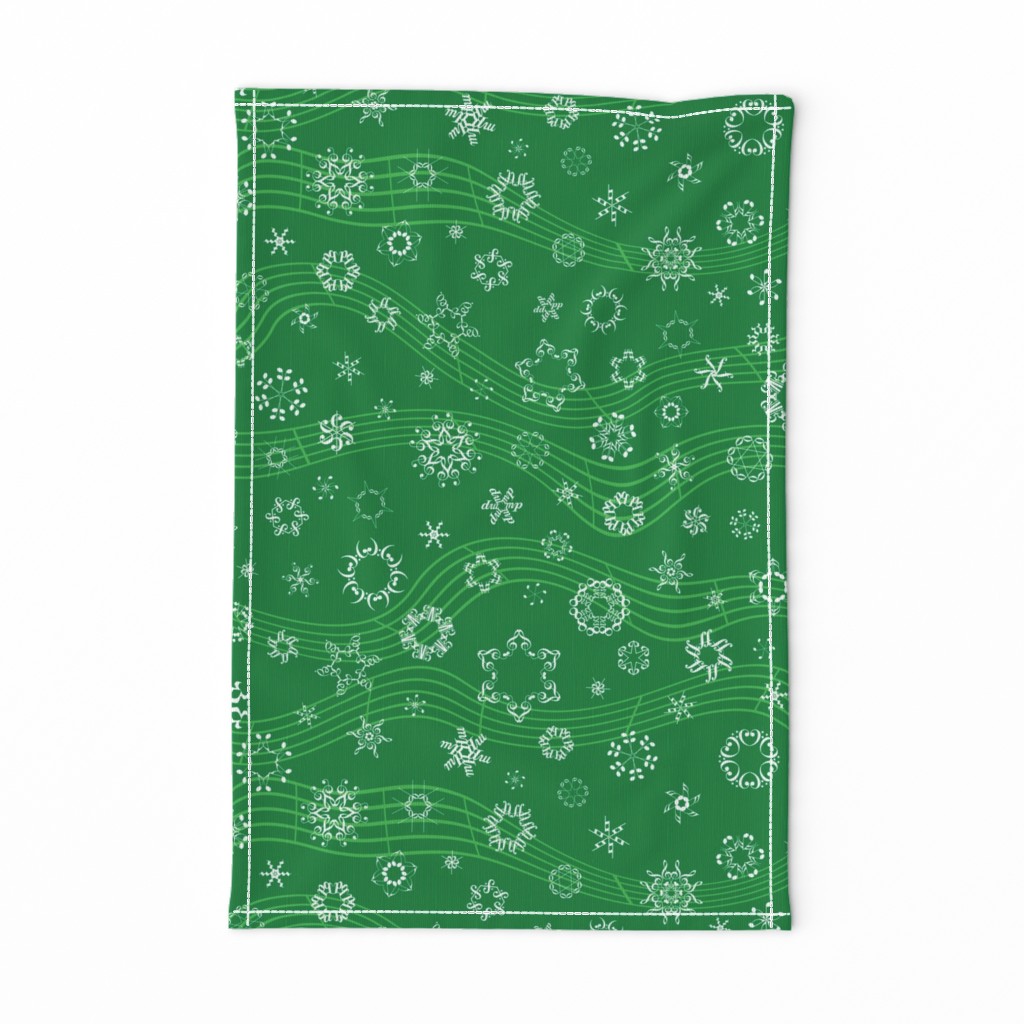 wind-blown musical snowflakes on deep spearmint green